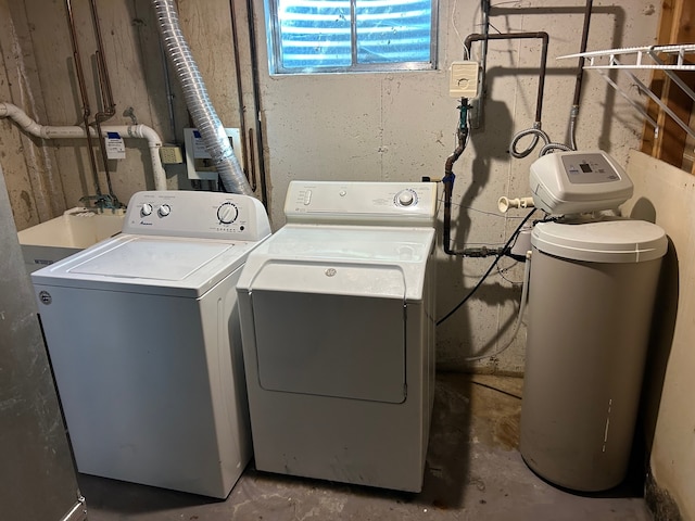 laundry room featuring washer and clothes dryer