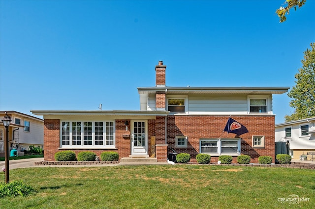 view of front facade with a front lawn