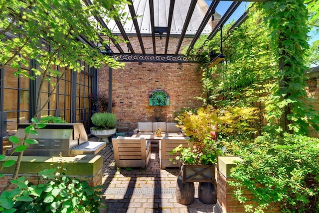 view of patio / terrace with a pergola and outdoor lounge area