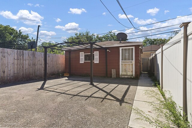 back of property featuring a patio area