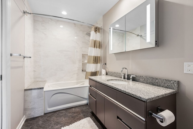 bathroom featuring vanity, shower / tub combo, and tile patterned flooring