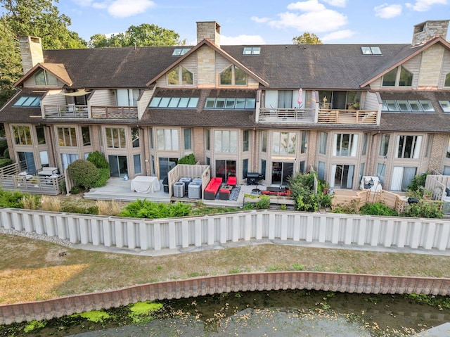 exterior space with a water view