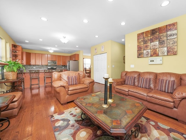 living room with light hardwood / wood-style floors