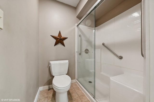 33 E Maple Ave, Cortland, IL 60112 - bathroom with a stall shower, baseboards, and toilet
