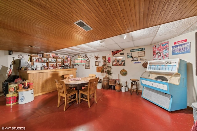 33 E Maple Ave, Cortland, IL 60112 - dining area with concrete flooring and bar