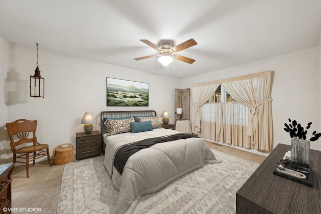 33 E Maple Ave, Cortland, IL 60112 - carpeted bedroom featuring a ceiling fan
