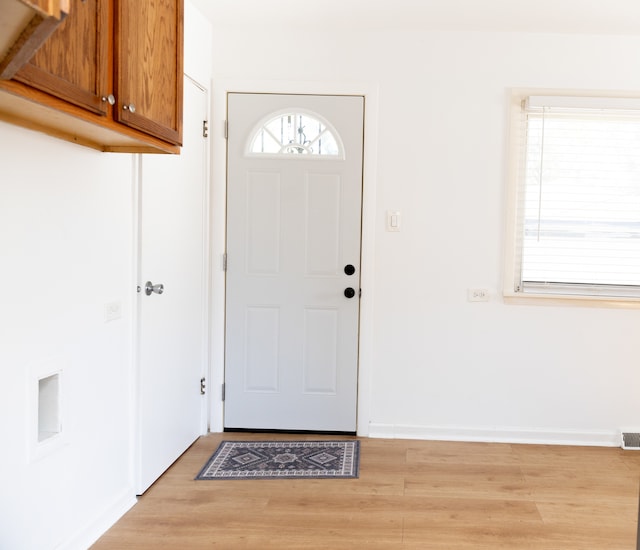 entryway with light wood-type flooring