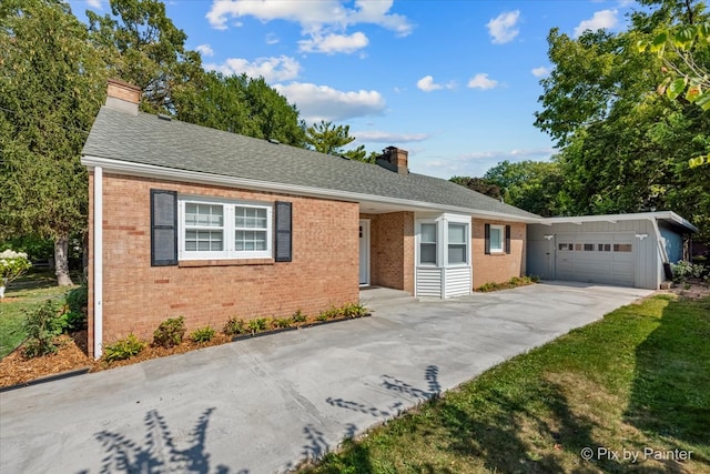 ranch-style house featuring a garage