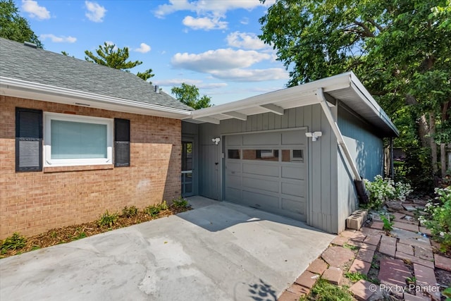 exterior space with a garage