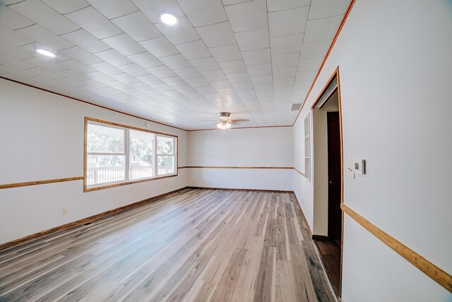 465 E Ash St, Watseka, IL 60970 - spare room featuring a ceiling fan, wood finished floors, baseboards, and recessed lighting