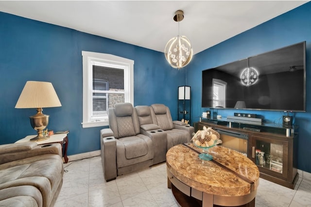 living room with an inviting chandelier