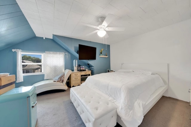 carpeted bedroom featuring ceiling fan and lofted ceiling