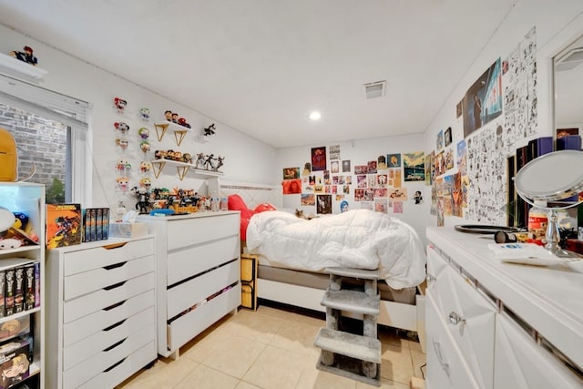 bedroom featuring light tile patterned flooring