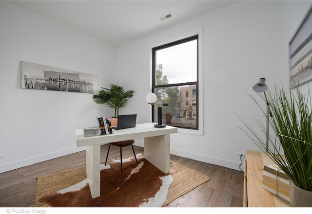 office area with dark hardwood / wood-style floors