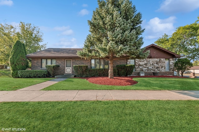 ranch-style house with a front yard