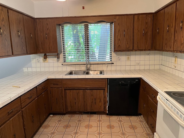 bathroom with tile walls, a bathing tub, vanity, and toilet