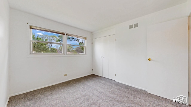 732 Luau Dr, Des Plaines, IL 60016 - unfurnished bedroom featuring carpet and baseboards