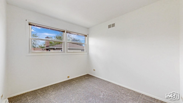 732 Luau Dr, Des Plaines, IL 60016 - spare room featuring carpet and baseboards