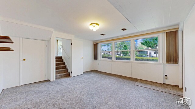732 Luau Dr, Des Plaines, IL 60016 - carpeted empty room featuring stairs