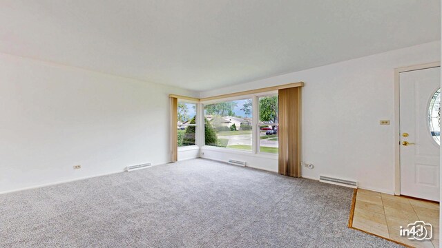 732 Luau Dr, Des Plaines, IL 60016 - entryway with carpet floors and baseboards