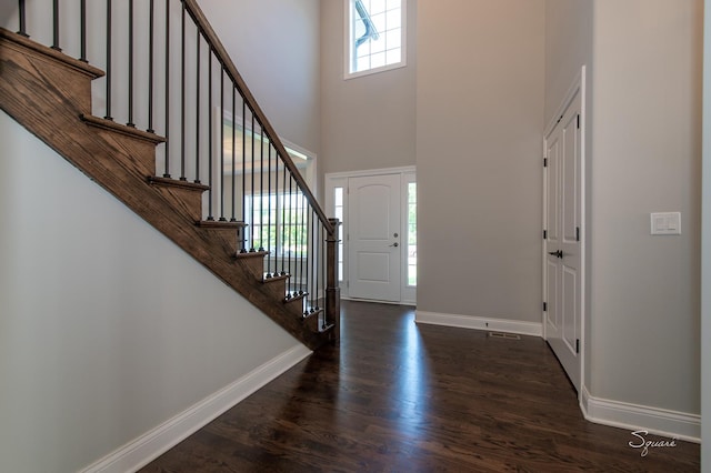 25W275 Doris Ave, Carol Stream, IL 60188 - entryway with a high ceiling, dark wood-style flooring, and stairway