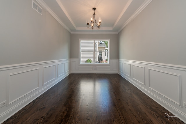 unfurnished room featuring a notable chandelier, a raised ceiling, crown molding, and dark hardwood / wood-style flooring