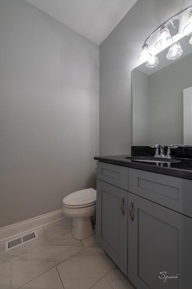 25W275 Doris Ave, Carol Stream, IL 60188 - half bath featuring vanity and marble look tile flooring
