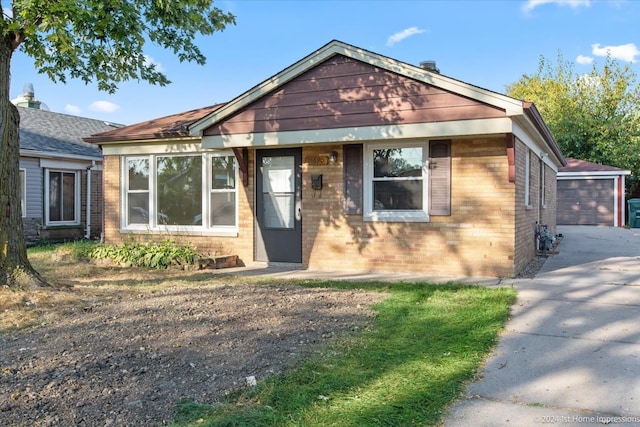 bungalow-style house featuring a garage