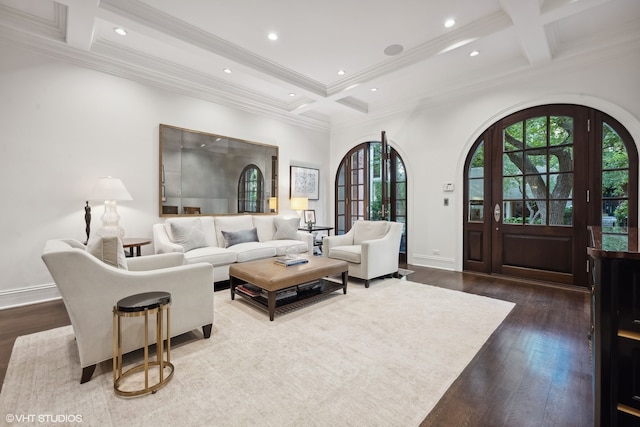 living room featuring coffered ceiling, beam ceiling, and hardwood / wood-style flooring