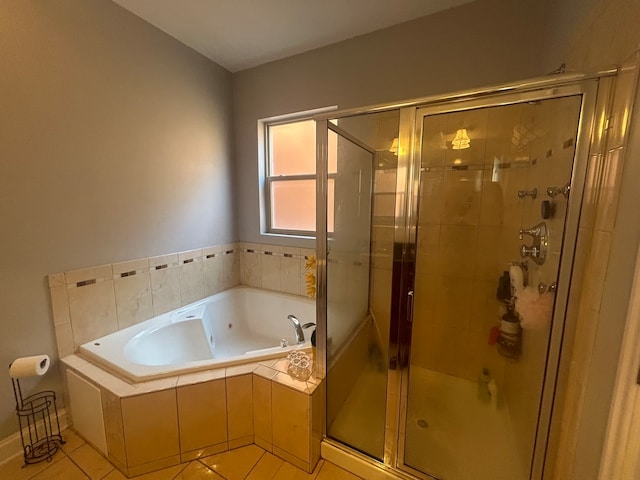 bathroom with tile patterned flooring and plus walk in shower