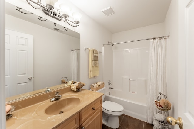 full bathroom with vanity, shower / bath combo, toilet, and tile patterned floors