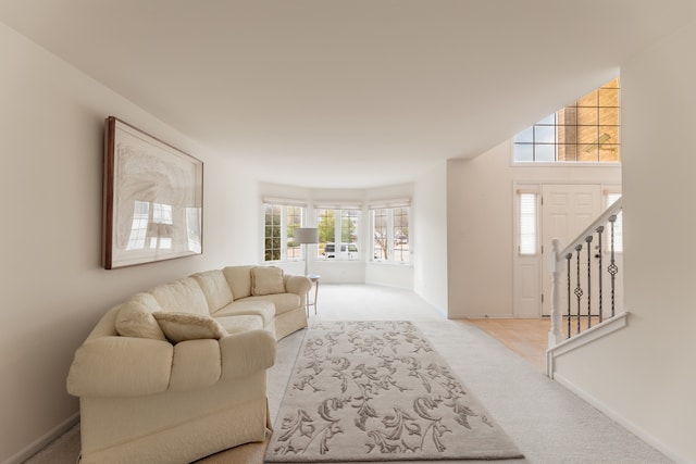 carpeted living room with plenty of natural light