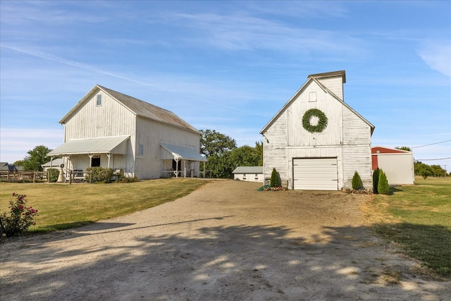 view of outdoor structure with a lawn