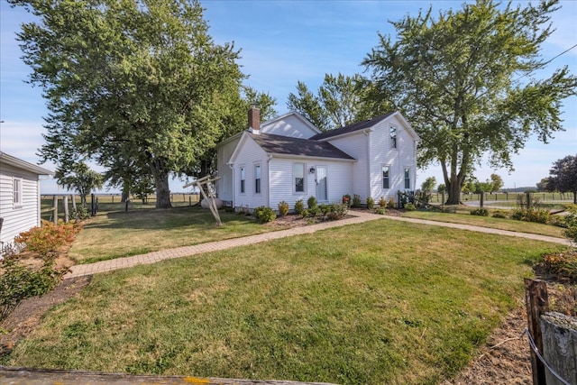 view of front facade with a front lawn