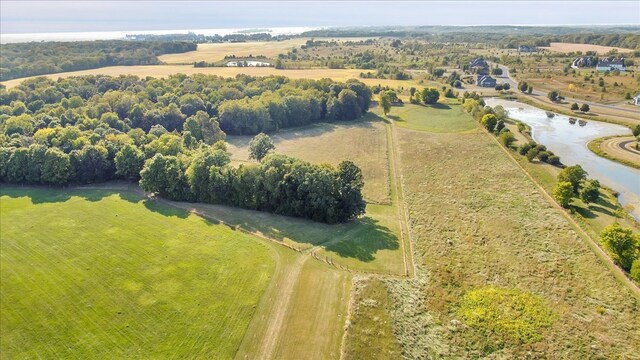 aerial view with a water view and a rural view