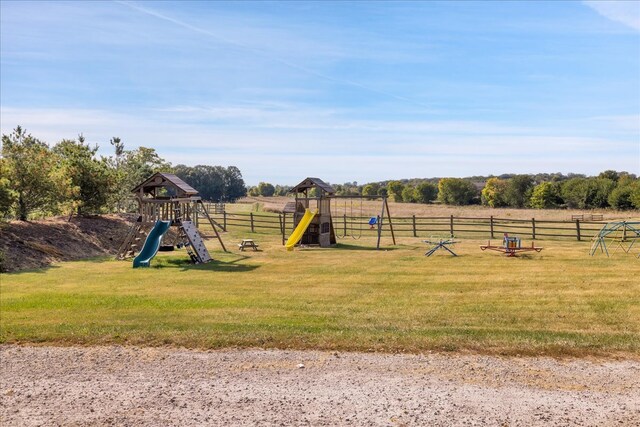 view of play area featuring a lawn