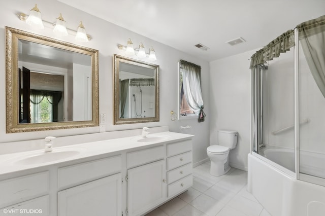 full bathroom with shower / bath combination with glass door, vanity, and toilet