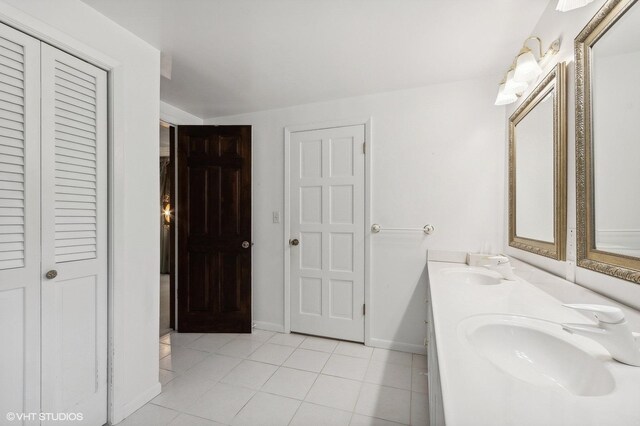 bathroom featuring vanity and tile patterned flooring