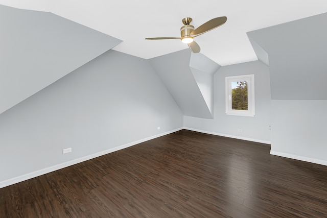 bonus room featuring vaulted ceiling, ceiling fan, and dark hardwood / wood-style flooring