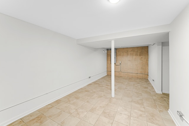 basement with light tile patterned floors