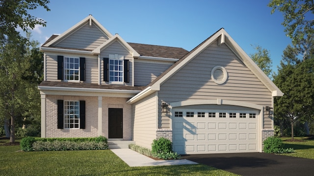 view of front facade with a front yard and a garage