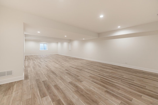 basement with light wood-type flooring