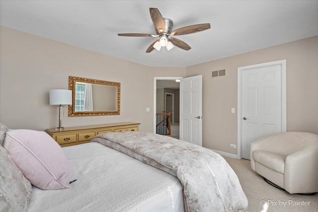 carpeted bedroom featuring ceiling fan