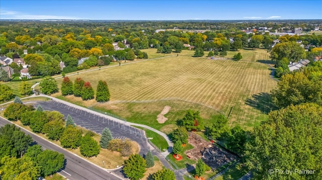 birds eye view of property with a rural view