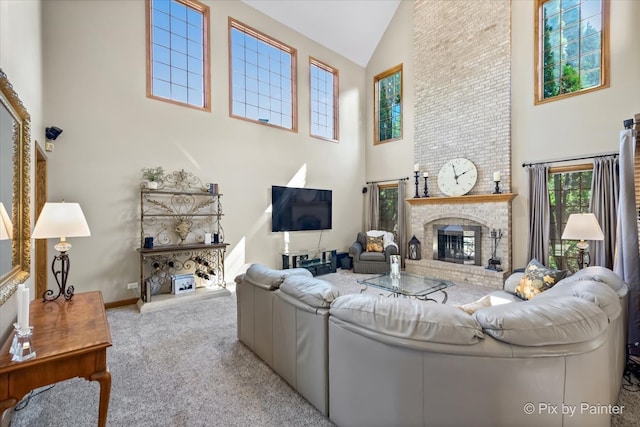 living room with light carpet, high vaulted ceiling, and a brick fireplace