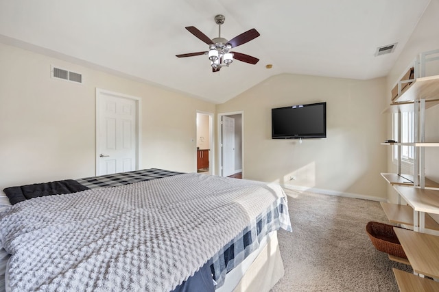 bedroom with ceiling fan, light carpet, and vaulted ceiling