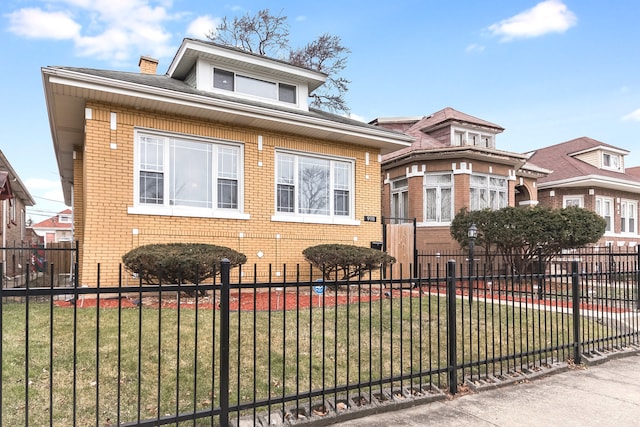 view of front of house with a front lawn