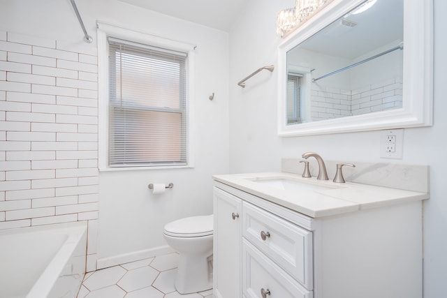 full bathroom featuring vanity, tiled shower / bath combo, toilet, and tile patterned floors