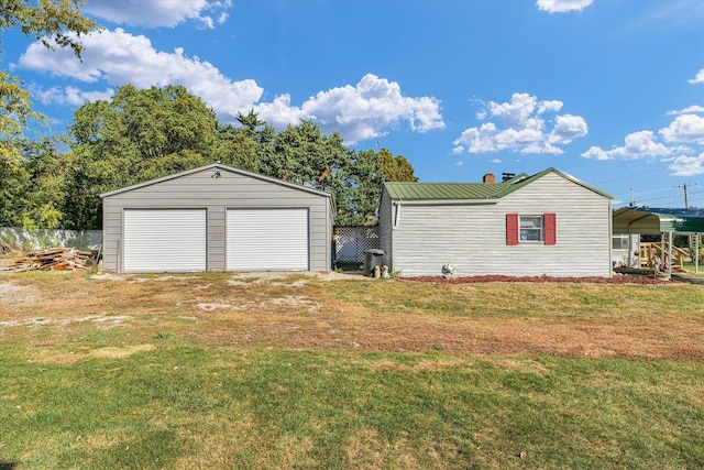 garage with a lawn