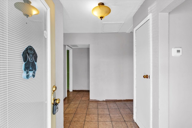 hall featuring tile patterned floors